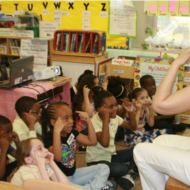 Teacher with students