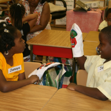 Student with INSIGHTS sock puppet